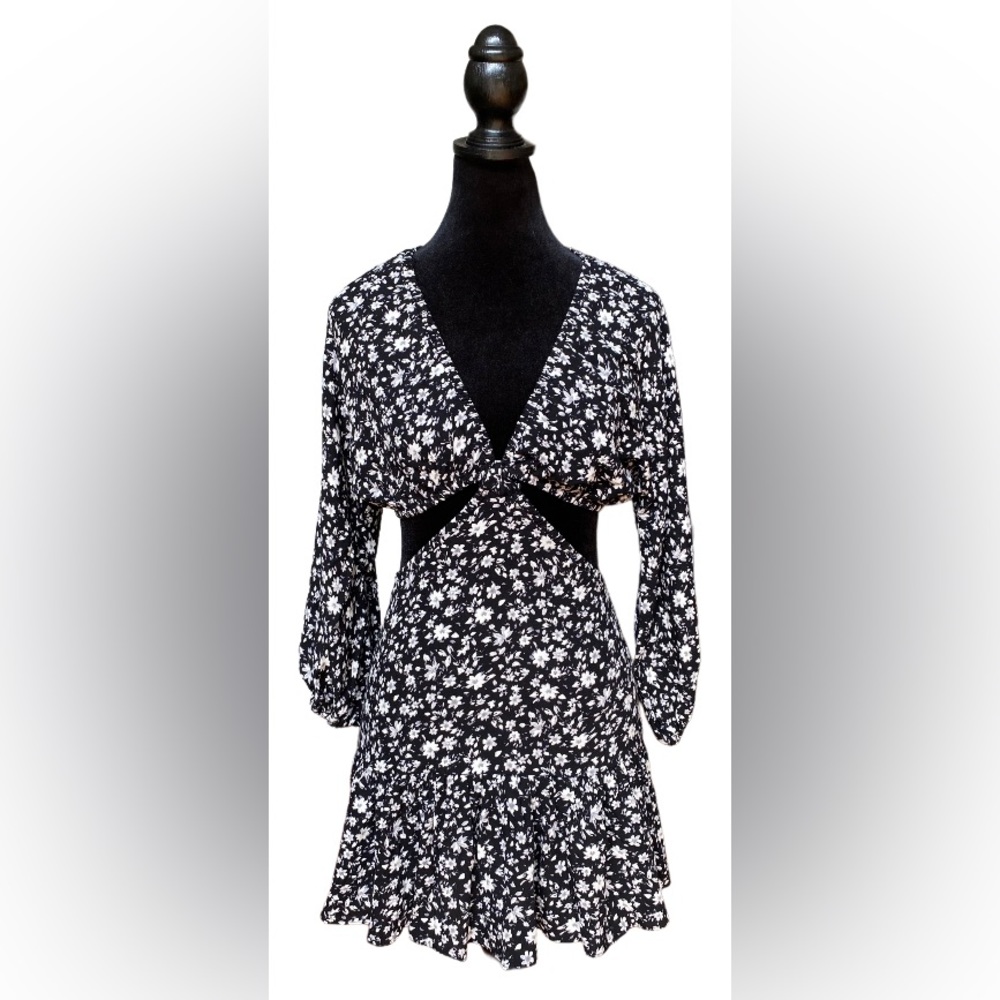 Maia: Black and White Dress with Cut out Sides